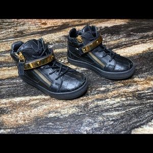 Boys black and gold sneakers